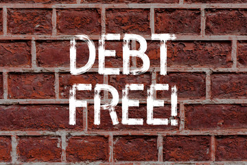 Text sign showing Debt Free. Business photo text does not owning any money or things to any individual or companies Brick Wall art like Graffiti motivational call written on the wall