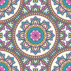 Decorative colorful ethnic seamless pattern for fabric or wrapping in oriental style. Hand drawn illustration