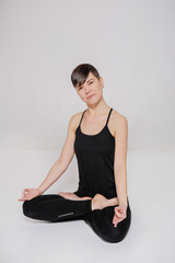 Fototapeta premium Fly yoga. Women practices aerial different yoga with a hammock.