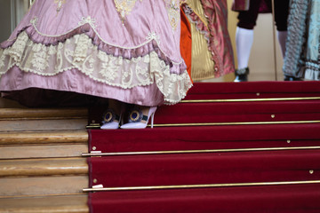 Shoes - Retro style royal medieval ball - Majestic palace with gorgeous people dressed in king and queen's friends dresses with accessories such as fan and hand puch as a handbag - 2019 © dissx