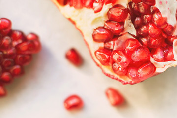 pomegranate seeds close-up. pomegranate on a light background