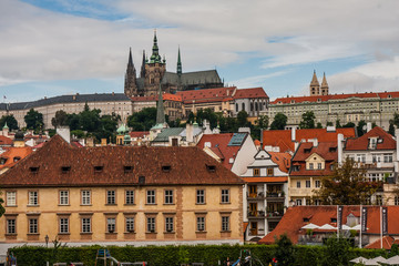 Naklejka na ściany i meble A view on Prague Castle from the left bank of Vltava River
