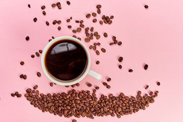 cup of coffee with beans on white background