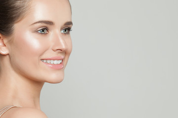 Fototapeta premium Beautiful woman with clear skin. Skincare and facial treatment