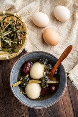 Obraz na płótnie Canvas Chinese health medicine, motherwort, boiled eggs
