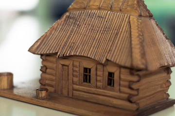 Obraz na płótnie Canvas Toy wooden house. Handmade small wooden house