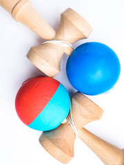 two Kendama japanese toys, competition sport concept, used and new toy isolated on white