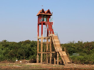 Spirit house with high stairs on Tonle Sap lake in Cambodia