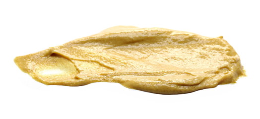 Yellow mustard sauce, spread isolated on white background