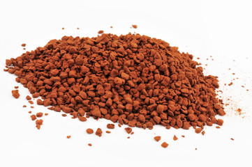 Instant coffee grains isolated on white background and texture