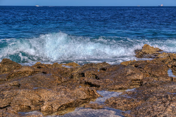 Coast of resort Bugibba with stormy waves