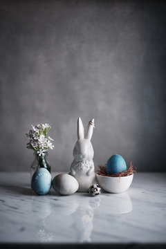 Easter decoration with easter eggs and bunny figurine