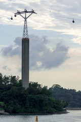 Cable car and cable car rails or Gondola lift and Tall concrete Post in Sentosa Singapore