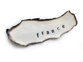 France Stamped on an old burned Paper, Fire april 2019