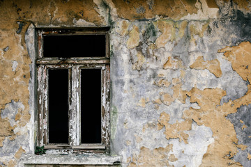 Fototapeta na wymiar Old window and worn wall background