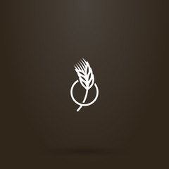 white sign on a black background. vector line art sign of a wheat spikelet in a round frame