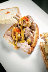 famous traditional portuguese bifana pork sandwich snack in lisbon cafe