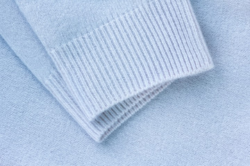 clothing detail of soft blue cashmere fabric