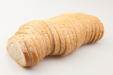 Top view of bread on white background.