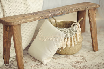 Beautifully decorated farmhouse look. cozy textiles blankets and pillows as an element of the...