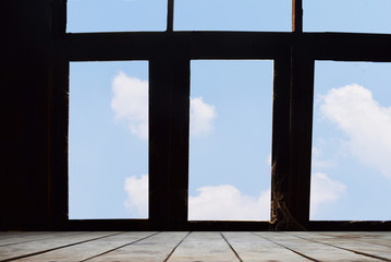 window with blue sky and clouds