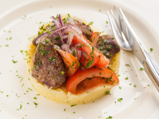 lamb roast with mashed potatoes and vegetables