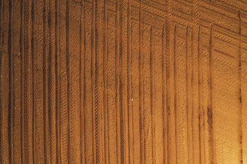 Aerial view of plowed agricultural field from drone pov, top view