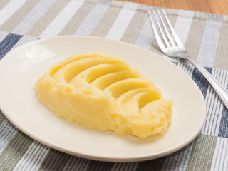 mashed potatoes on a white plate