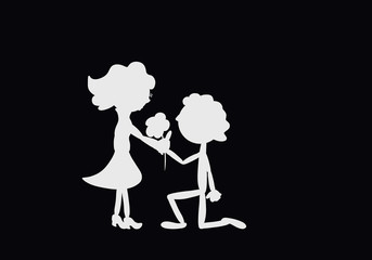 Woman takes a flower from the hands of a man kneeling