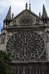 Obraz premium The roof of the iconic Notre Dame Cathedral. Notre Dame Cathedral in Paris, the symbol of the beauty and history. Construction began in 1163 and was completed in 1345.Sunny summer day in France City. 