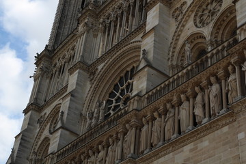 The roof of the iconic Notre Dame Cathedral. Notre Dame Cathedral in Paris, the symbol of the beauty and history. Construction began in 1163 and was completed in 1345.Sunny summer day in France City. 