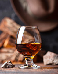 Glass of cognac or whiskey.