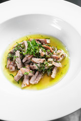 marinated pork with garlic and coriander olive oil gourmet tapas