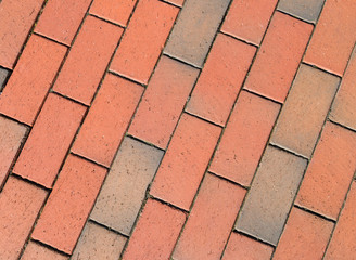 Photo of red brick patterns designed by construction workers and contractors.