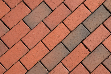 Photo of red brick patterns designed by construction workers and contractors.
