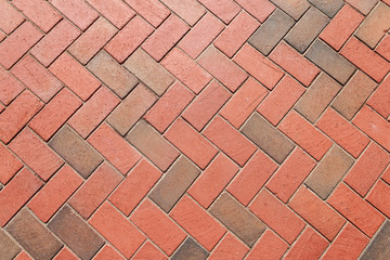 Photo of red brick patterns designed by construction workers and contractors.