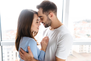Beautiful young couple drinking coffee