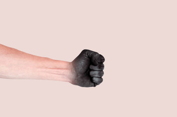 Fototapeta premium Isolated real hand photo on creamy background. Dirty black paint gradient. Artistic artwork concept design with space for text. Creative minimalistic backdrop. Natural nude color scheme. Art template