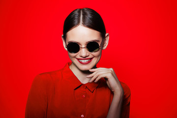 fashion model in sunglasses, beautiful young woman.