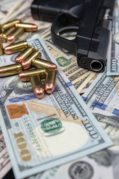 Handgun with ammunition and money