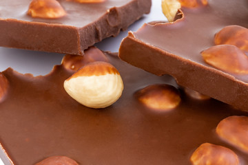chocolate with nuts isolated on white background.