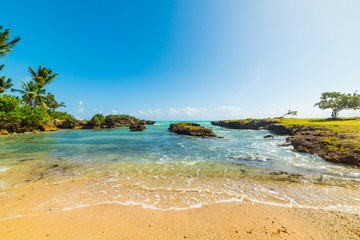 Golden sand in a small cove in Guadeloupe