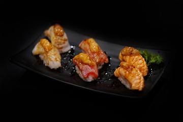 Japanese food: Maguro Shu Shi on black background. Clean food concept. Selective focus and free space for text.