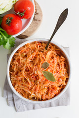 Cabbage stew made from: cabbage, onion, carrot, celery and tomatoes.