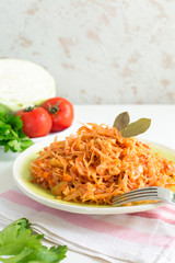 Cabbage stew made from: cabbage, onion, carrot, celery and tomatoes.