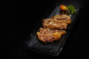 Japanese food: Stirred beef with sauce served with Japanese cooked rice on table. Clean food concept. Toned image. Selective focus and free space for text.