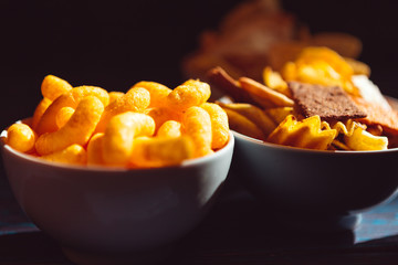 Snack mix. Salty treat for snacking. Dark background