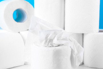 Toilet paper. Close up shot on blue background