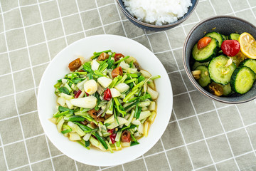 Chinese cuisine salad with cucumber slices and pickled peppers