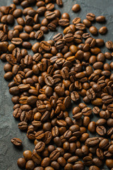 coffee beans (good and bad grain) - arabica and robusta blend (roasted coffee grain). Black background. Top view . Copy space